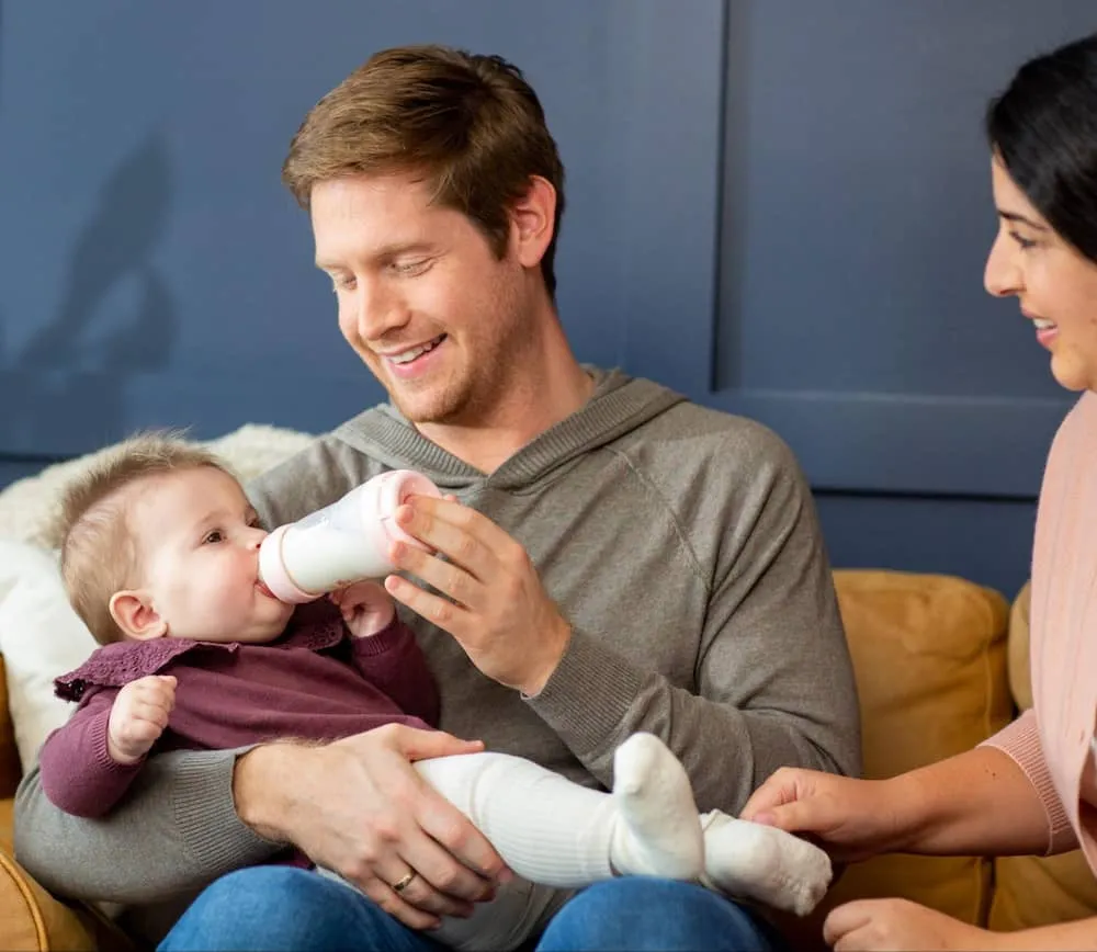 Mother-and-Father-feeding-baby